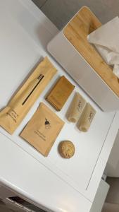 a white refrigerator with wooden items in it at Studio 13 Warsaw in Warsaw