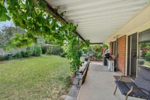 a patio with two chairs and a yard at Cockles on Willmett road in Goolwa