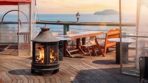 a fireplace on the deck of a cruise ship at Muuido Haedungsil Pension in Incheon +2 photos