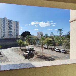a view from a window of a parking lot at Golden Dolphin Grand Hotel piscinas 24 hs MP in Caldas Novas
