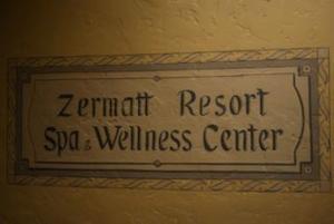 a sign on a wall that reads tenant resort spa wellness center at Zermatt Mountain Lodge Studio in Midway +10 photos