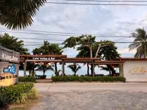 a gas station with a sign in front of it at Klang Aow Resort in Khanom