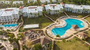 an aerial view of a resort with a swimming pool at Paradisus by Meliá Palma Real Golf and Spa Resort - All Inclusive in Punta Cana +142 photos