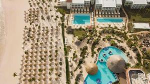 an aerial view of a resort with a swimming pool at Paradisus by Meliá Palma Real Golf and Spa Resort - All Inclusive in Punta Cana