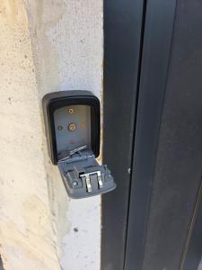 a metal box on the side of a wall at Fragma in Targovishte