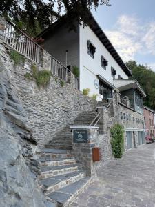 a stone stairway leading up to a house at LaVue - Forest Twin Rooms in La-Roche-en-Ardenne