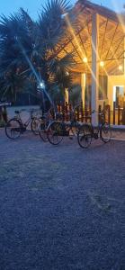 a group of bikes parked in front of a building at Kite Brothers Resort in Kalpitiya