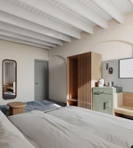 a bedroom with a large bed and a kitchen at Harbour Rocks by Ode Hotels in Sydney