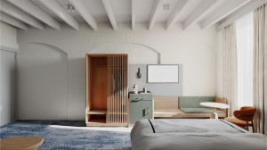 a bedroom with a bed and a table and a chair at Harbour Rocks by Ode Hotels in Sydney