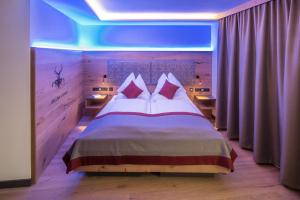 Una cama o camas en una habitación de Sonne 1806 - Hotel am Campus Dornbirn