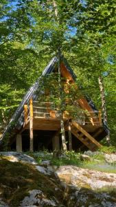 a tree house in the middle of a forest at Gorska Dolina in Ivanova Korita