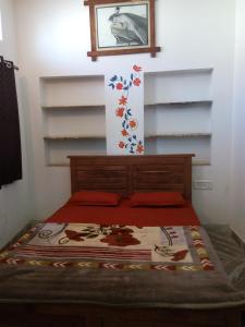 Ліжко або ліжка в номері Suri Guest House
