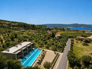 an aerial view of a resort with a swimming pool at Gialova Sunset Apartment in Gialova