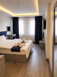 a hotel room with a large bed in a room at Reflection of the Bosphorus in Istanbul