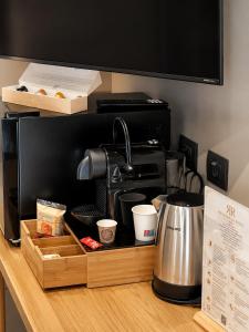 a coffeemaker sitting on top of a counter at Residenza Ricci in Azzano San Paolo