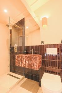 a bathroom with a sink and a toilet at Casa Liana Saint-Tropez in Saint-Tropez +33 photos