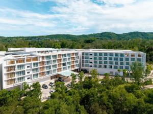 an aerial view of a large white building at Radisson Resort Layan Phuket in Layan Beach