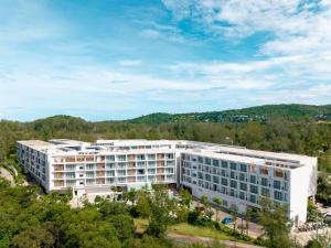an aerial view of a large white building at Radisson Resort Layan Phuket in Layan Beach