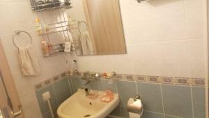 a bathroom with a sink and a mirror at Harmony in Sveti Vlas +13 photos