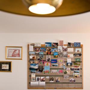 a collage of photos on a wall at Hofwiese in Hohenschwangau