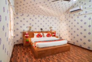 a bedroom with a bed in a room at Chokhi Dhani Desert Camp in Sām