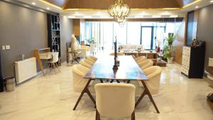 a dining room with a table and chairs at Murree best apartment in Murree