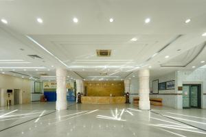 a large hall with columns in a building at SAILING TOWER Hotel in Khang Qui
