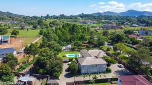 an aerial view of a house with a yard at Kris Star Lodge in Blantyre