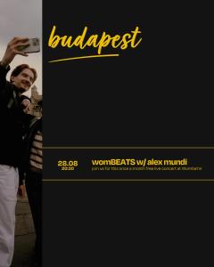 a man is taking a picture with a camera at Wombat's City Hostel Budapest in Budapest