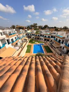 a view from the roof of a building with a swimming pool at Villa Roja in Bigastro