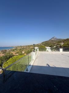 a view from the roof of a house with the ocean at Vasilia Cove Boutique Hotel in Nicosia