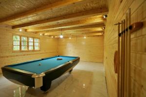 a billiard room with a pool table in it at Shavsheti view Cottage in Didachara