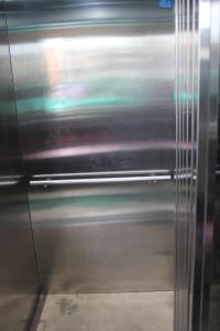 a stainless steel refrigerator in a room at Srivari Lodge in Arcot +5 photos