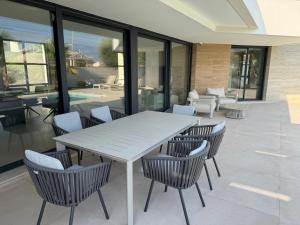 a white table and chairs on a patio at Our long Vacation in Quesada in Ciudad Quesada