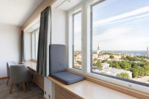 a window seat with a view of the city at Original Sokos Hotel Viru in Tallinn