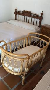 a pair of twin beds in a room at Refugio de Montaña "El Caroche" Alojamiento entero in Enguera