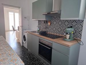 a kitchen with a mixer on a counter top at Borghetto sant'irene in Erchie