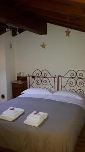 Postel nebo postele na pokoji v ubytování Orizzonte Casa Vacanze