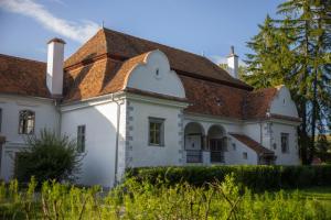 a large white house with a brown roof at Polixenia Culinary Estate  +63 photos