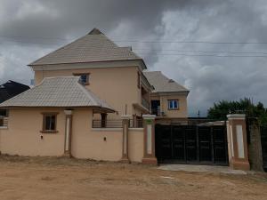 a house with a gate in front of it at Amnu Homes Apartment in Ilorin