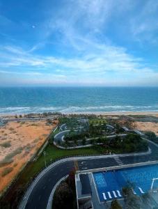 an aerial view of a road near the ocean at Thanh Son Apartment Mui Ne Beachfront in Ấp Thiẹn Ái