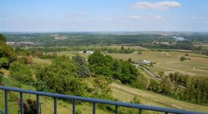 a view of the countryside from the top of a hill at La Maison du Guetteur in Sancerre +2 photos