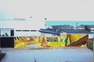 a building with a mural on the side of it at Isimi haven in Lekki