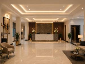 a lobby of a hotel with a reception desk at IndiGo Line Hotel - Opp Paradise Biryani Shamshabad in Hyderabad