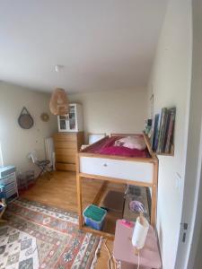 a small bedroom with a bed in a room at Appartement Antoine in Rennes