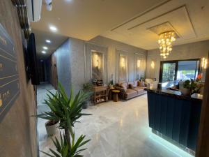 a living room with a couch and a table at Alabi Hotels in Istanbul