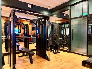 a gym with treadmills and machines in a room at RUZ Hotels in Istanbul