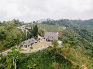 an aerial view of a house on a hill at The Old Country Stone House in Cebu City