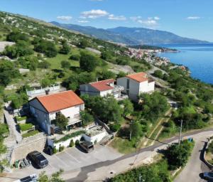 an aerial view of a small town next to the water at Apartmens Mendula in Senj