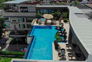 an overhead view of a swimming pool on a building at Stayon5a Av penthouse with PrivatePool in Playa del Carmen